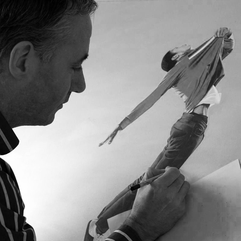 Fergal Keane working on a large graphite drawing in the studio