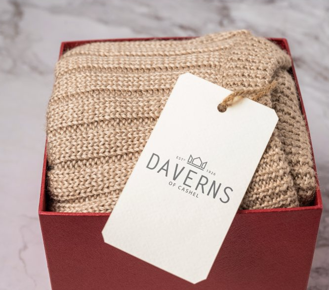 Knitwear boxed in wine with a Daverns swing tag